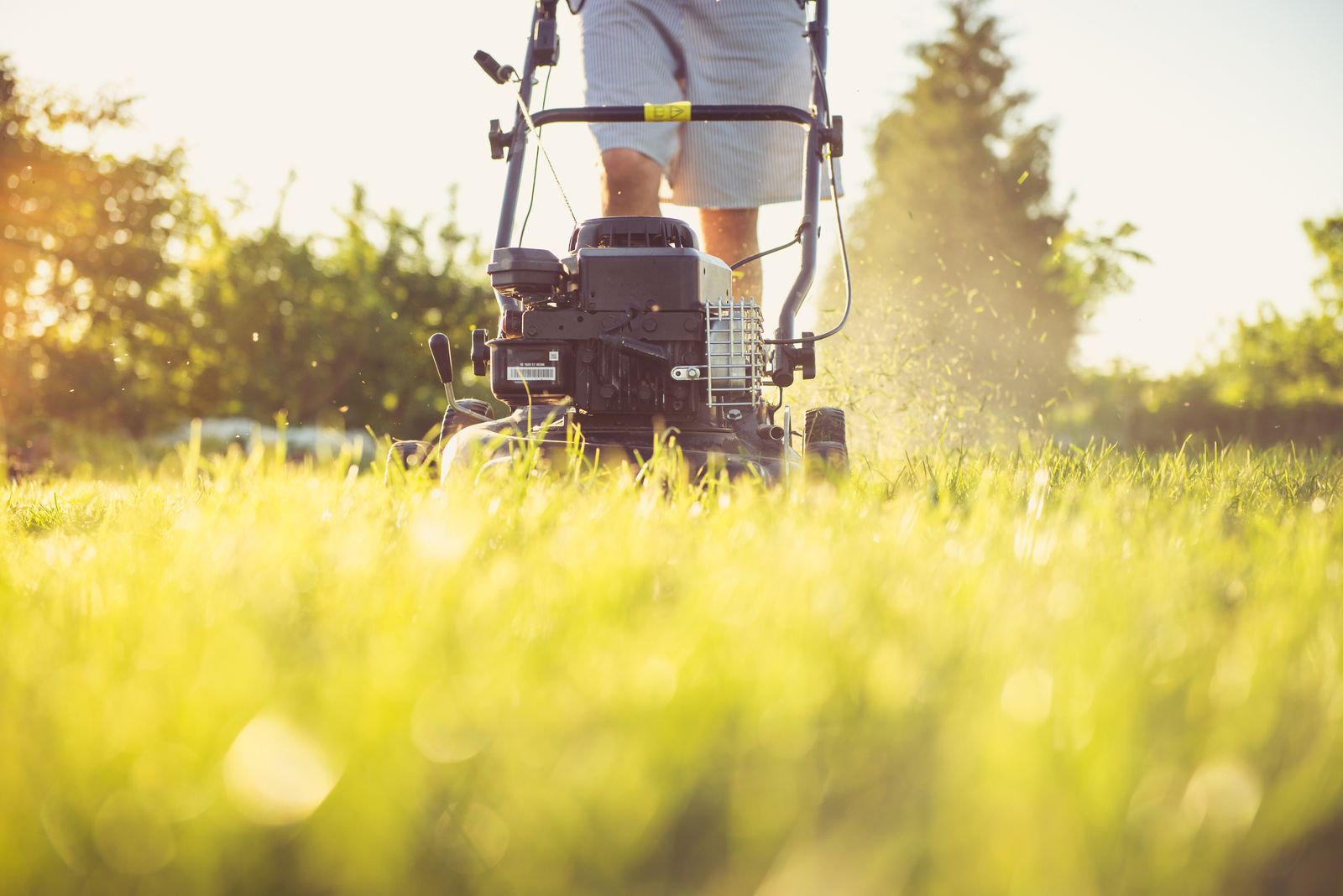 Escobar Landscaping crew mowing a lawn